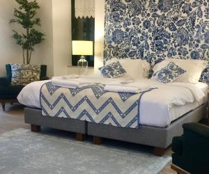 Posteľ alebo postele v izbe v ubytovaní Villa Vager Mani Hotel