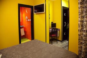 Telewizja i/lub zestaw kina domowego w obiekcie JC Rooms Santo Domingo