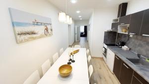 A kitchen or kitchenette at Le Monde Apartment Bratislava - amazing 5BDR in downtown