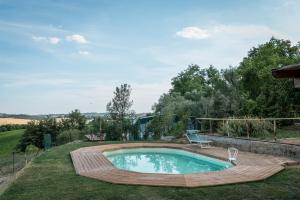 The swimming pool at or close to Agriturismo Le Tre Pietre - Podere nel Chianti