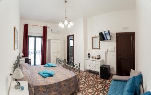 Posteľ alebo postele v izbe v ubytovaní Casa degli Artisti Diamante