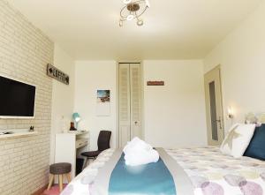 Ένα ή περισσότερα κρεβάτια σε δωμάτιο στο Appart'AZUR Haguenau - Centre Grand'Rue - Logements entiers pour voyageur pro