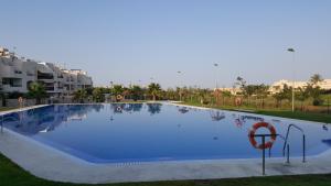 The swimming pool at or near Apartments Sol de Almeria Golf y Playa