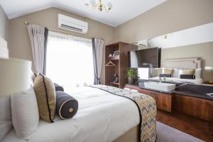 Lova arba lovos apgyvendinimo įstaigoje Trinity Townhouse Hotel