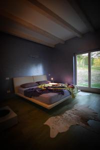 Postel nebo postele na pokoji v ubytování Villa Montecolori