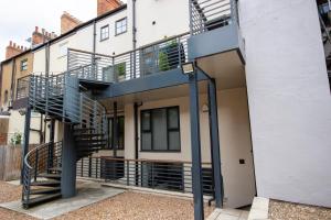 a building with a spiral staircase on the side of it at HU1 City Centre Hub (sleeps 6) in Hull