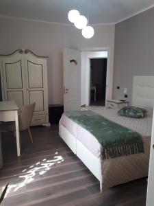 Giường trong phòng chung tại Casale degli Ulivi