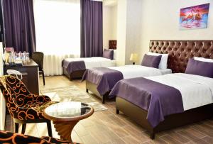 Postel nebo postele na pokoji v ubytování Supreme Hotel Baku