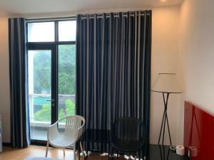 Posezení v ubytování Gia Huyền Hotel + 22 fotografií