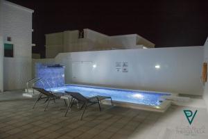 Bazén v ubytování THE POOL VILLA - TANUF nebo v jeho okolí