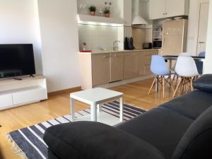 Kuchnia lub aneks kuchenny w obiekcie Portosín -Suites
