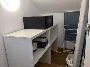 Telewizja i/lub zestaw kina domowego w obiekcie Portosín -Suites