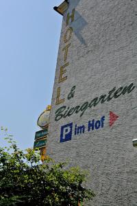 
a building with a sign on the front of it at Hotel Leander in Bitburg
