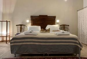 Posteľ alebo postele v izbe v ubytovaní Villa Vager Mani Hotel