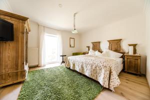 Voodi või voodid majutusasutuse Hotel St. Hubertushof toas