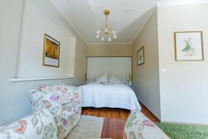 מיטה או מיטות בחדר ב-Hotel St. Hubertushof