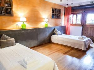 Katil atau katil-katil dalam bilik di Casa do Plátano