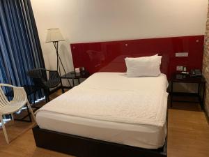 Postel nebo postele na pokoji v ubytování Gia Huyền Hotel