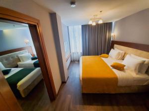 Galería fotográfica de Albanopolis Hotel en Tirana 57 fotos más