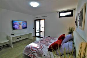 Holiday House and Spa Lanzarote tesisinde bir oturma alanı