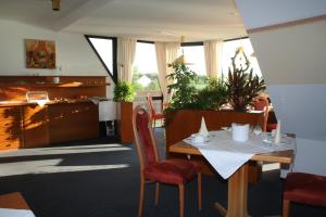 A restaurant or other place to eat at Hotel & Restaurant Dortmunder Eck