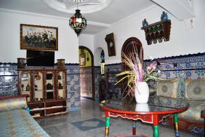 TV a/nebo společenská místnost v ubytování Hotel Casa Khaldi