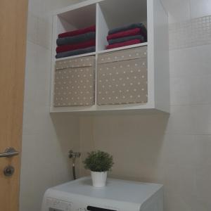 Koupelna v ubytování Apartment with garage Lavici
