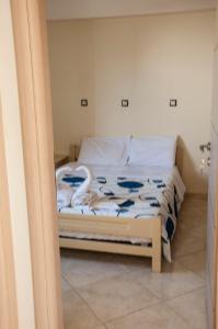 Postel nebo postele na pokoji v ubytování Minas-Maria House