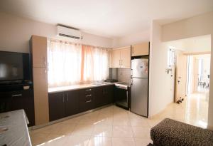 Kuchyň nebo kuchyňský kout v ubytování Minas-Maria House