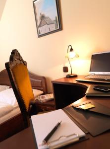 Postel nebo postele na pokoji v ubytování Hotel Strk