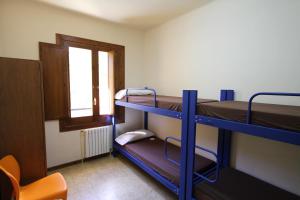 Posteľ alebo postele v izbe v ubytovaní Alberg Roques Blanques
