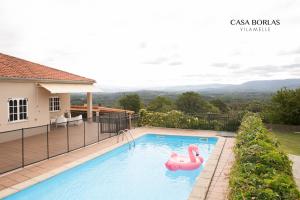 The swimming pool at or close to Casa Borlas