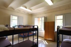 Posteľ alebo postele v izbe v ubytovaní Alberg Roques Blanques