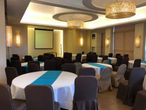 A área empresarial e/ ou a sala de conferências de Hotel Lorenza