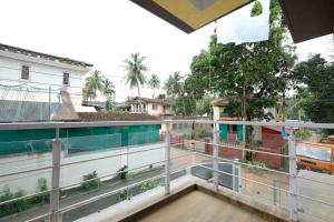 a view from the balcony of a house at Nishka holiday home in Candolim