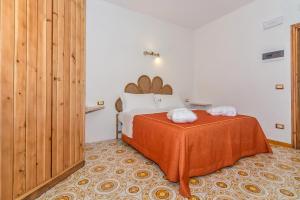 Postel nebo postele na pokoji v ubytování Villa Valdroni