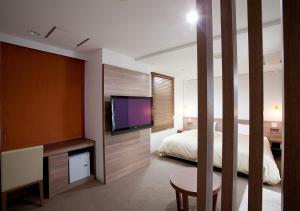 TV a/nebo společenská místnost v ubytování Hotel Sorriso Hamamatsu