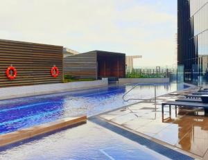 The swimming pool at or near StayCentral Docklands Delight