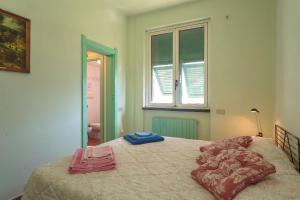 Posteľ alebo postele v izbe v ubytovaní Villa Pia Recco