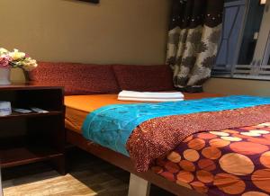 Voodi või voodid majutusasutuse Rich Hostel toas