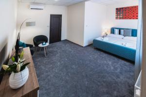 Postel nebo postele na pokoji v ubytování Apartmány na Bašte