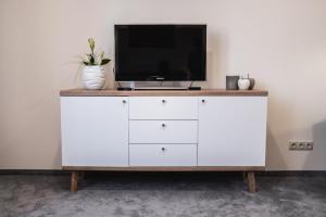 TV a/nebo společenská místnost v ubytování Apartmány na Bašte + 25 fotografií
