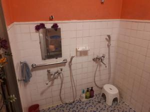 Een badkamer bij Asian guesthouse Border
