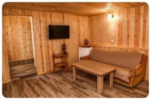 TV a/nebo společenská místnost v ubytování Hayi Tun Guest House
