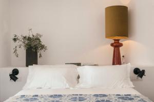 Posteľ alebo postele v izbe v ubytovaní Casita Casita Lindos - Adults Only