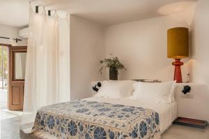 Posteľ alebo postele v izbe v ubytovaní Casita Casita Lindos - Adults Only