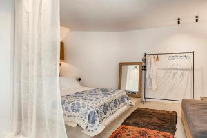 Posteľ alebo postele v izbe v ubytovaní Casita Casita Lindos - Adults Only