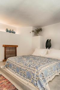 Posteľ alebo postele v izbe v ubytovaní Casita Casita Lindos - Adults Only