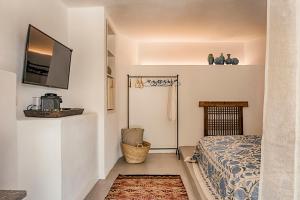 Posteľ alebo postele v izbe v ubytovaní Casita Casita Lindos - Adults Only