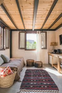 Televízia a/alebo spoločenská miestnosť v ubytovaní Casita Casita Lindos - Adults Only